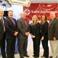 Saint Alphonsus Regional Medical Center and CWI representatives in classroom.
