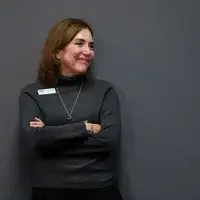 Joan Weddington listening to students speak