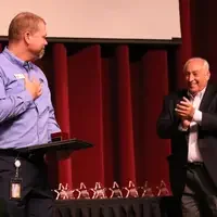 CWI employee, Phil Varrick, receiving the 2017 Staff of the Year award.