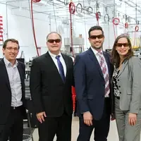 Members of the JPMorgan Chase senior leadership team tour CWI's Micron Center for Professional Technical Education.