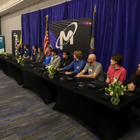 Students preparing to sign