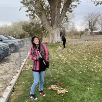 Law Enforcement student raking leaves