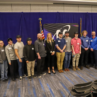 New cohor of apprentices posing for a picture