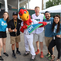 President Jones and members of CWI's Enrollment Team with Humphrey the Hawk