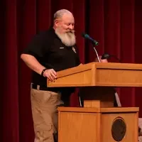 Program Director, LeRoy Forsman, speaking to graduates