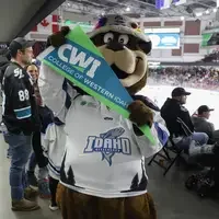 Blue holding CWI swag