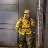 Student working out of building