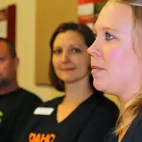 Nikki Houston (right) shares her story during a CWI Foundation Board of Directors meeting.