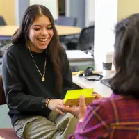 Ruby Araujo studying using flash cards