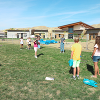 Riverstone International students working with CWIs Anthropology Club