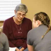 OTA students working with resident