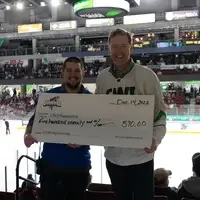 President Gordon Jones with check