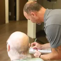OTA student working with resident