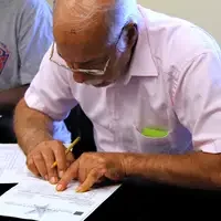 Students challenge their skills by filling out crossword puzzles using common words they will regularly use.