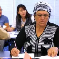 Students challenge their skills by filling out crossword puzzles using common words they will regularly use.