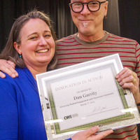 Winners hold their certificates at a faculty professional development event.