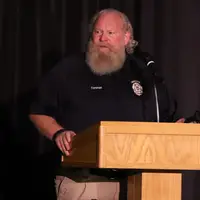 Law Enforcement Program Director, LeRoy Forsman, addressing graduates