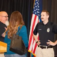 Student speaking with instructor