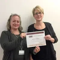 Melissa Wallace with her scholarship