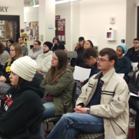 Audience listening to Common Read Series panel discussion