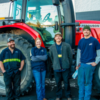 Donated tractor with students