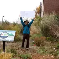 Natural garden signage with wishing well check