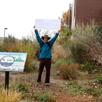 Natural garden signage with wishing well check