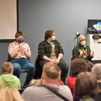 LGBTQ+ Panel Discussion panelists answering questions