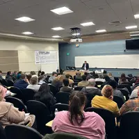 Crowd listening to Parrys presentation