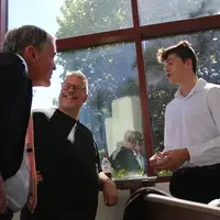 Coaches and student practicing