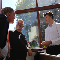 Coaches and student practicing