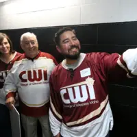 CWI staff and leadership posing for a selfie during CWI Night at the Idaho Steelheads