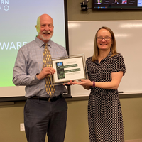 Susan Aydelotte receiving an award