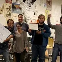 Art Faculty and students with wishing well check