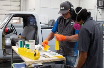 CWI Student and Instructor mixing Bondo for vehicle repair
