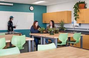 Students working with plants in classroom 