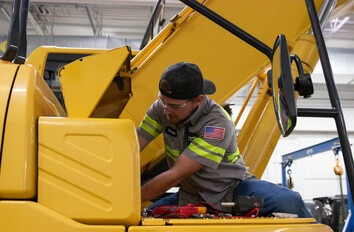 CWI Student working on a piece of heavy equipment