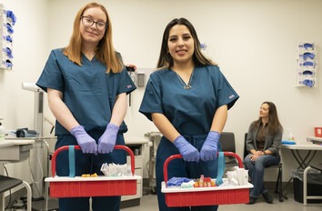 Phlebotomy students with supplies in clinic