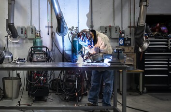 Welding student working in lab