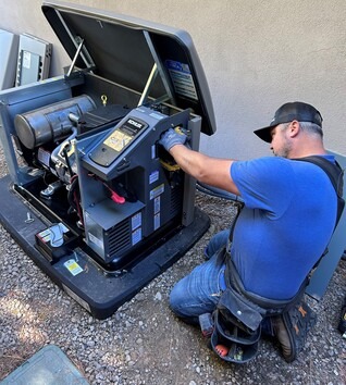 Electrician working on a generator