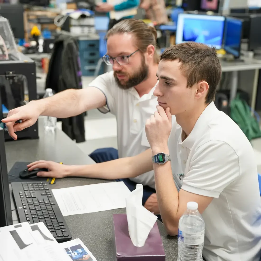 Two students sitting at a computer