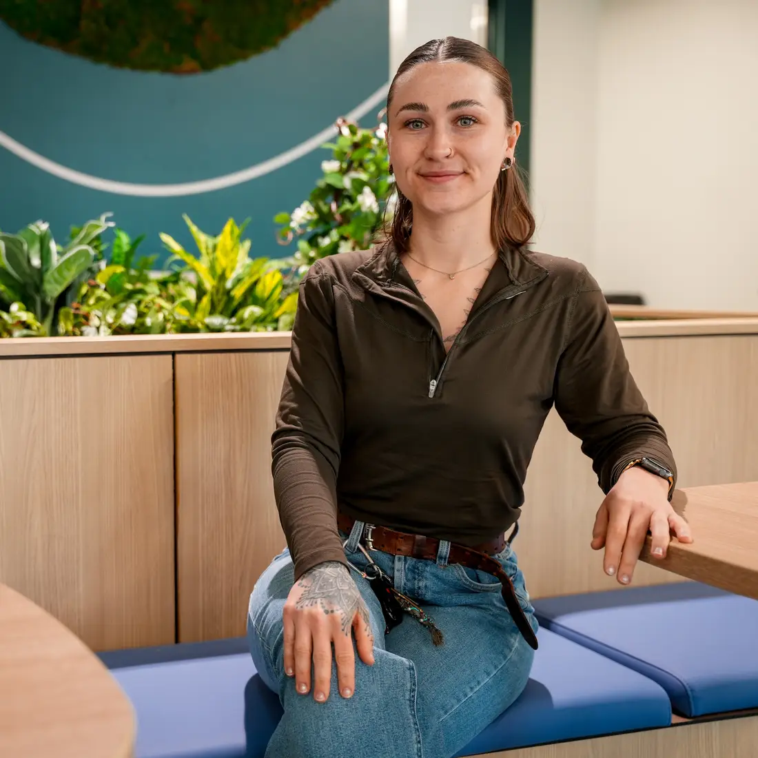 ShanDale Youmans sitting near plant box