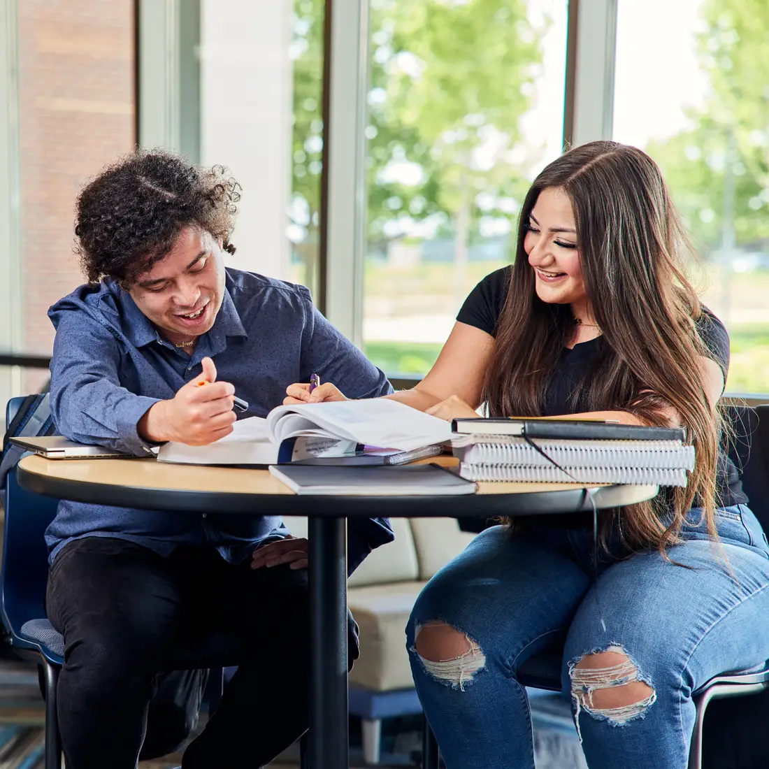 Two people working on an assignment
