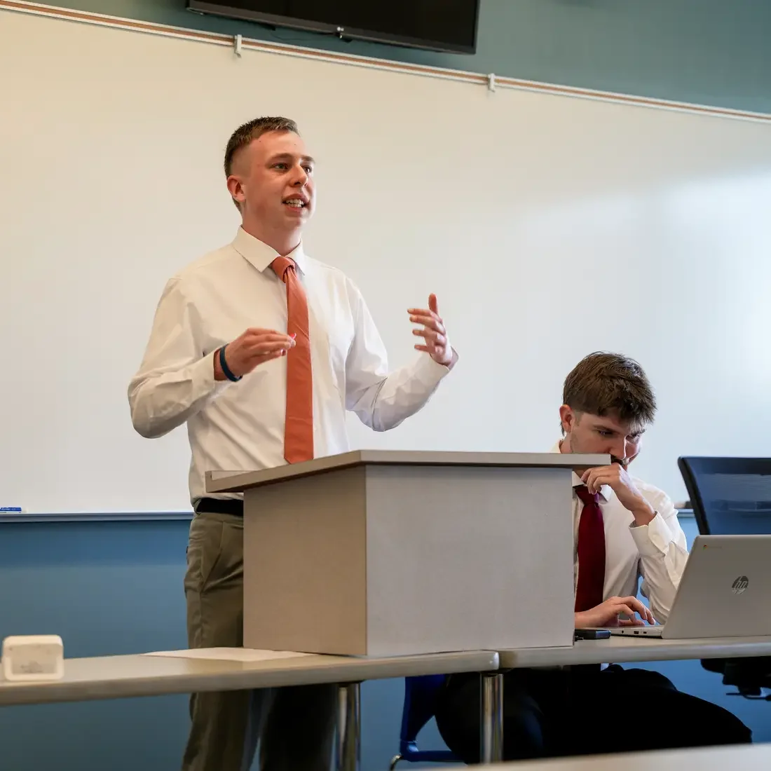 Student speaks in front of audience