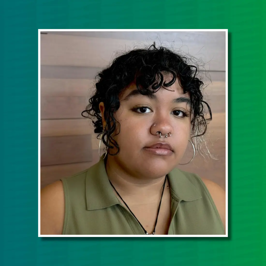 Picture of LeAndra Onya in front of green background