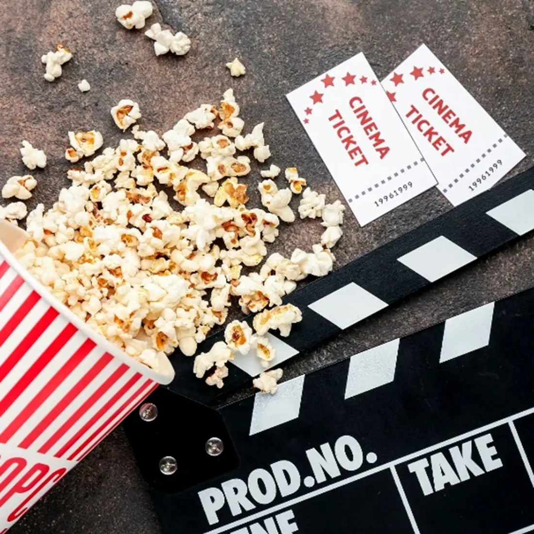 Popcorn bucket, tickets, and clapperboard