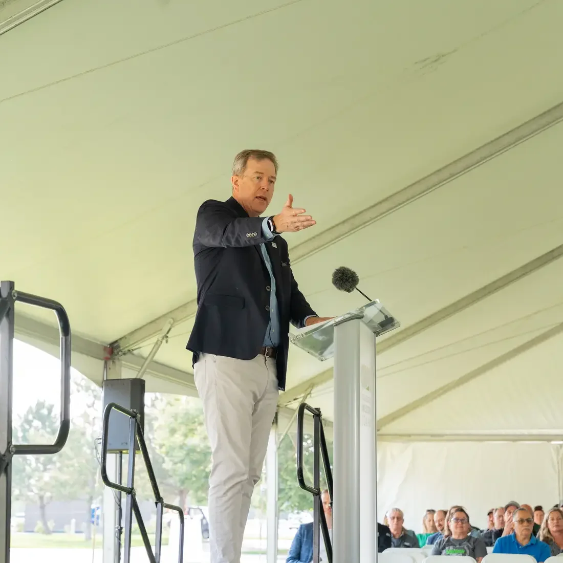 President Gordon Jones stands behind podium