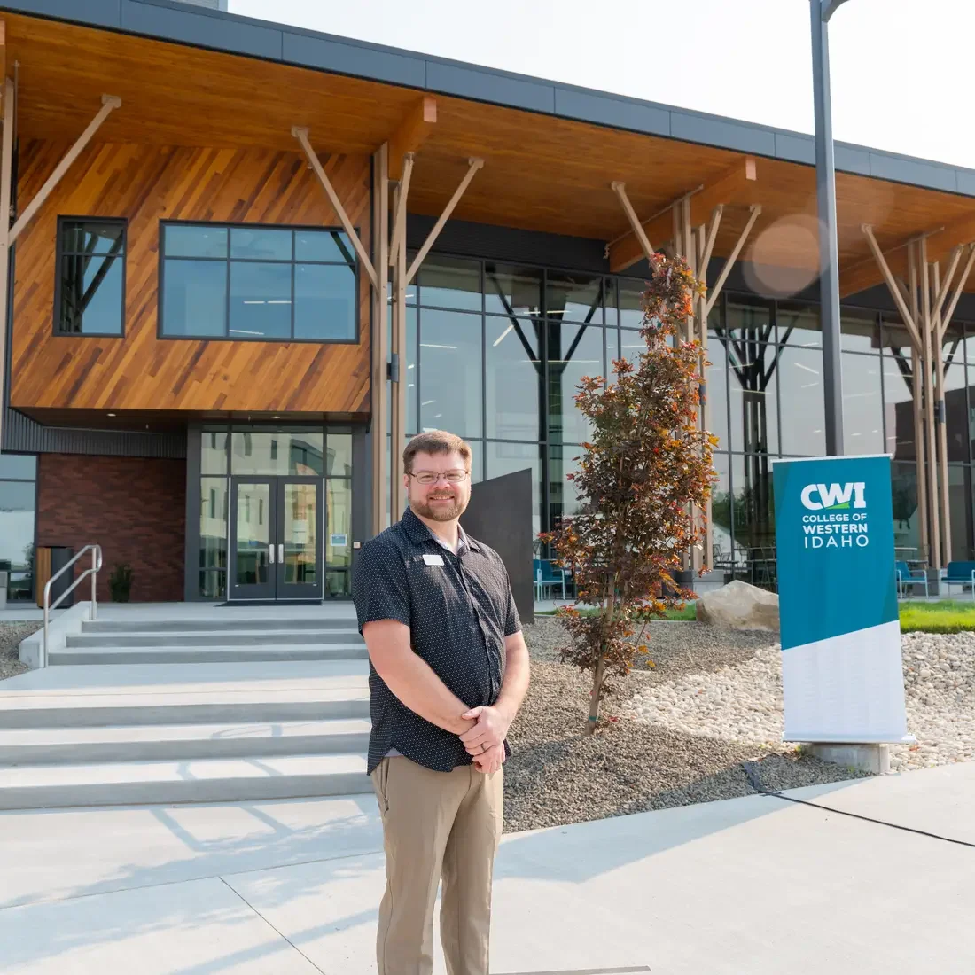 Ryan Hanson standing outside of Student Success Center