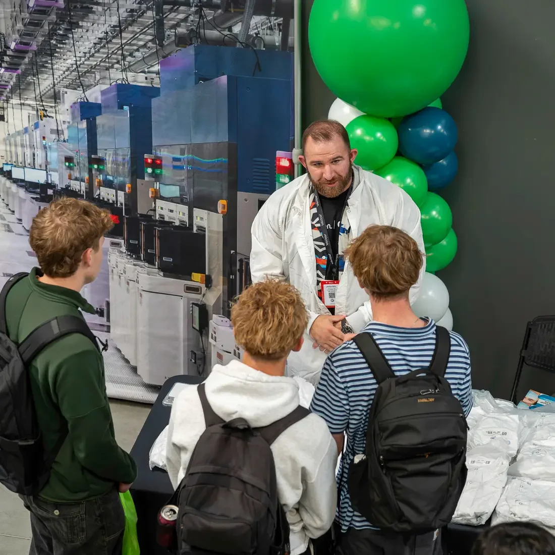 Micron employee talking to students