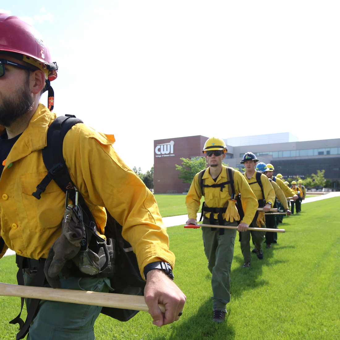 Recruits during Basic Fire School in front of the Nampa Campus Academic Building